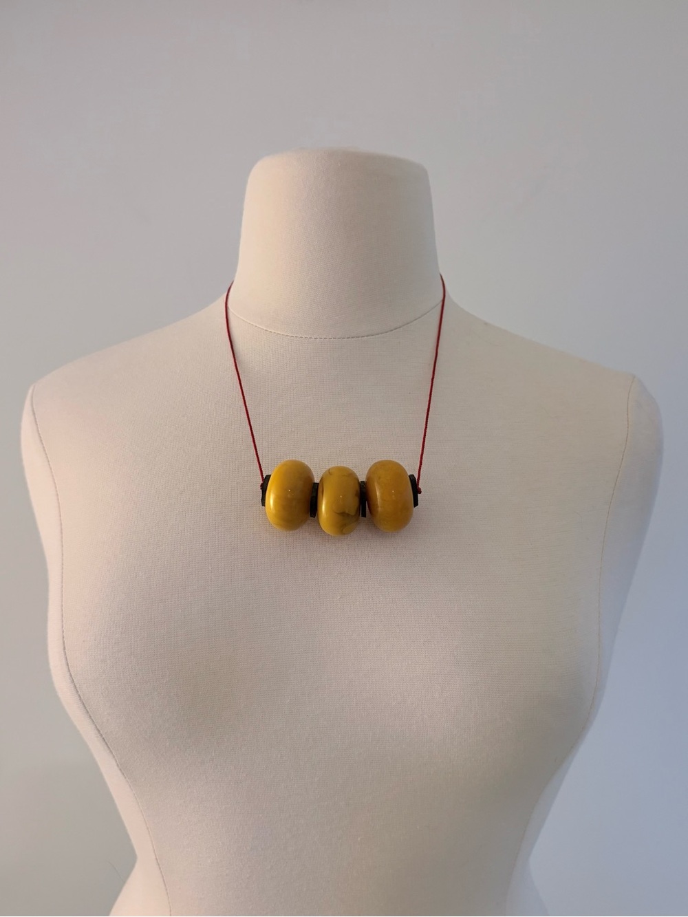 Primitive yellow beaded necklace